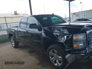 2014 Chevrolet Silverado 1500 LT with VIN 1GCVKREC5EZ325771, listed as a IAAI auction lot 41691858 with 123,475 mi miles and . Bid and sale history available at DreamBid. Image 14.
