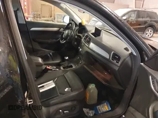 2017 Audi Q3 Premium z VIN WA1ECCFS3HR015665, wystawiony jako IAAI lot #42080113 z przebiegiem 142 149 mil mil oraz . Historia ofert i sprzedaży dostępna na DreamBid. Obrazek 5.