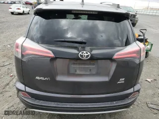 2016 Toyota RAV4 SE with VIN JTMJFREV9GJ088756, listed as a Copart auction lot 69210994 with 0 mi miles and Salvage Title. Bid and sale history available at carsss.com. Image 6.