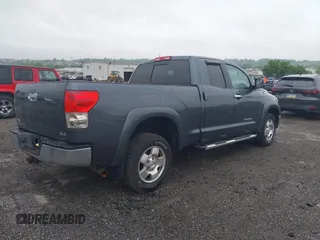 2008 Toyota Tundra z VIN 5TFBV54148X071912, wystawiony jako IAAI lot #42209379 z przebiegiem 261 492 mil mil oraz . Historia ofert i sprzedaży dostępna na DreamBid. Obrazek 4.