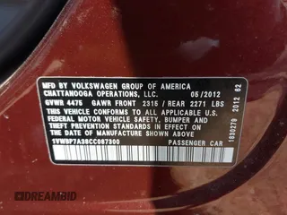 2012 Volkswagen Passat SE z VIN 1VWBP7A38CC087300, wystawiony jako IAAI lot #41752522 z przebiegiem 266 958 mil mil oraz . Historia ofert i sprzedaży dostępna na DreamBid. Obrazek 9.