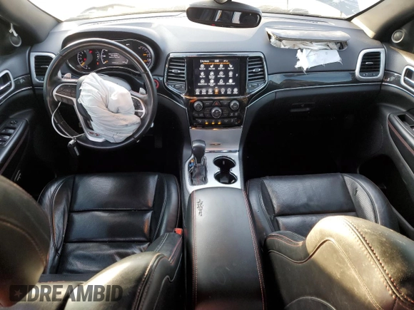 2020 Jeep Grand Cherokee Trailhawk with VIN 1C4RJFLT9LC430514, listed as a Copart auction lot 85311924 with 170,554 mi miles and Salvage title. Bid and sale history available at DreamBid. Image 8.