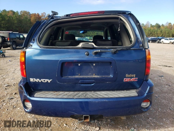 2005 GMC Envoy SLE with VIN 1GKDS13S352369384, listed as a Copart auction lot 79996394 with 117,697 mi miles and Salvage Title. Bid and sale history available at carsss.com. Image 6.
