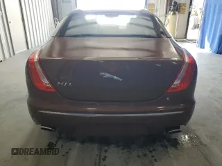 2011 Jaguar XJ XJL z VIN SAJWA2GB8BLV22081, wystawiony jako Copart lot #57088325 z przebiegiem 117 795 mil mil oraz Czysty tytuł • Clean title. Historia ofert i sprzedaży dostępna na DreamBid. Obrazek 6.