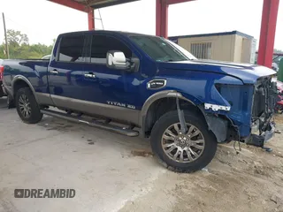 2016 Nissan Titan Platinum Reserve z VIN 1N6BA1F20GN509360, wystawiony jako IAAI lot #41921670 z przebiegiem 164 784 mil mil oraz . Historia ofert i sprzedaży dostępna na DreamBid. Obrazek 14.