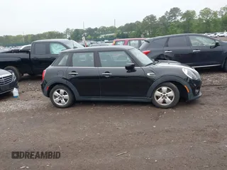 2020 MINI Hardtop 4 Door Cooper with VIN WMWXU7C04L2L58635, listed as a IAAI auction lot 42383785 with 27,160 mi miles and . Bid and sale history available at DreamBid. Image 13.