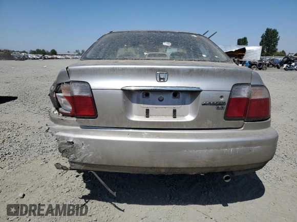1997 Honda Accord LX with VIN 1HGCD5630VA007257, listed as a Copart auction lot 66043264 with 265,262 mi miles and Salvage Title. Bid and sale history available at DreamBid. Image 6.