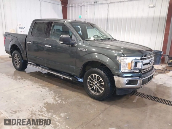 2018 Ford F-150 XL with VIN 1FTEW1EG3JKE52823, listed as a IAAI auction lot 41413009 with 142,057 mi miles. Bid and sale history available at carsss.com. Image 1.