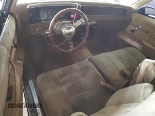 1987 Chevrolet Monte Carlo z VIN 1G1GZ11H6HR117922, wystawiony jako Copart lot #45329575 z przebiegiem 49 753 mil mil oraz Tytuł czysty. Historia ofert i sprzedaży dostępna na DreamBid. Obrazek 8.