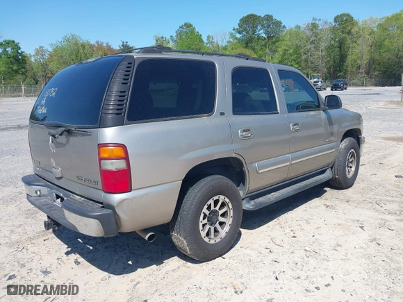 2001 Chevrolet Tahoe LS with VIN 1GNEK13T41R130752, listed as a IAAI auction lot 41966288 with 304,851 mi miles. Bid and sale history available at carsss.com. Image 4.