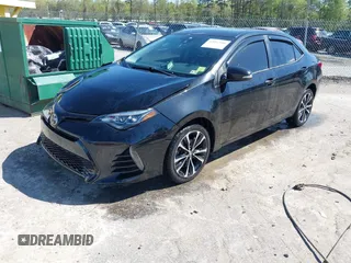 2019 Toyota Corolla L z VIN 5YFBURHE2KP897493, wystawiony jako IAAI lot #42052106 z przebiegiem 100 303 mil mil oraz . Historia ofert i sprzedaży dostępna na DreamBid. Obrazek 2.