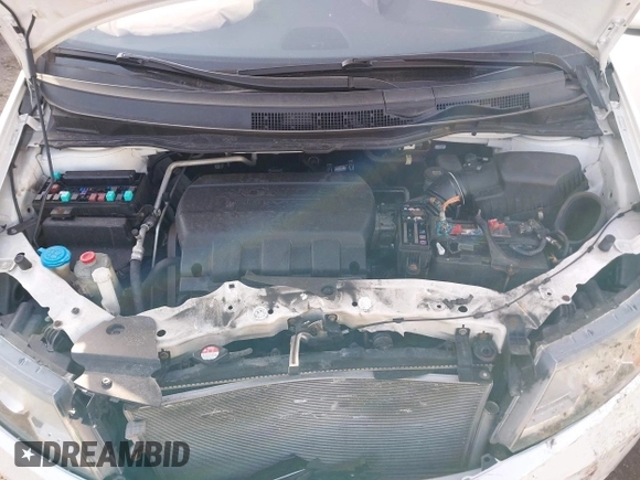 2014 Honda Odyssey Touring with VIN 5FNRL5H97EB037358, listed as a IAAI auction lot 41832825 with 208,894 mi miles and . Bid and sale history available at DreamBid. Image 10.