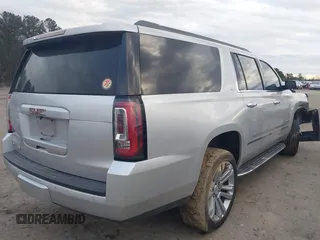 2019 GMC Yukon XL SLT with VIN 1GKS1GKC8KR383694, listed as a IAAI auction lot 41466213 with 128,368 mi miles. Bid and sale history available at carsss.com. Image 4.