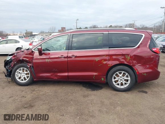 2021 Chrysler Pacifica Touring L with VIN 2C4RC1BG6MR597911, listed as a IAAI auction lot 41660729 with 72,004 mi miles and . Bid and sale history available at DreamBid. Image 14.