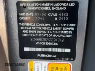 2006 Aston Martin Vantage z VIN SCFBB03B26GC01810, wystawiony jako Copart lot #75127204 z przebiegiem Nie podano mil oraz Nie do naprawy • Non repairable. Historia ofert i sprzedaży dostępna na DreamBid. Obrazek 13.