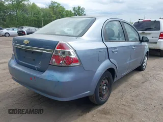 2007 Chevrolet Aveo LS z VIN KL1TD56657B179393, wystawiony jako IAAI lot #42135698 z przebiegiem 127 126 mil mil oraz . Historia ofert i sprzedaży dostępna na DreamBid. Obrazek 4.