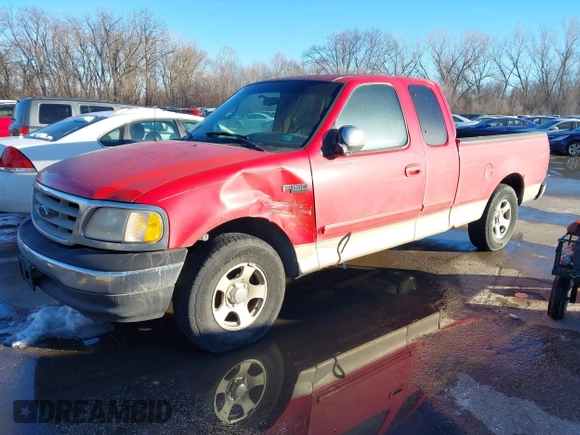2000 Ford F-150 XL with VIN 1FTZX1724YKB03258, listed as a IAAI auction lot 41356935 with 208,570 mi miles. Bid and sale history available at carsss.com. Image 2.