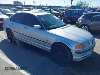 2000 BMW 3 Series 323i with VIN WBAAN3346YNC92421, listed as a IAAI auction lot 41734441 with 213,770 mi miles. Bid and sale history available at carsss.com. Image 1.
