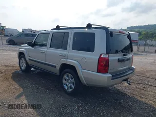2007 Jeep Commander Sport z VIN 1J8HG48K87C696538, wystawiony jako IAAI lot #39853716 z przebiegiem 226 491 mil mil oraz . Historia ofert i sprzedaży dostępna na DreamBid. Obrazek 3.