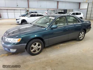 1997 Lexus ES 300 Luxury Sport Sdn with VIN JT8BF22GXV0010912, listed as a Copart auction lot 74691214 with 111,733 mi miles and Salvage Title. Bid and sale history available at carsss.com. Image 1.