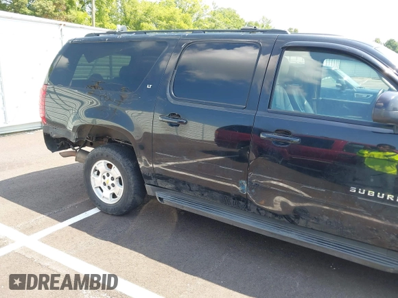 2011 Chevrolet Suburban LT with VIN 1GNSKJE34BR151246, listed as a IAAI auction lot 42520210 with 239,240 mi miles and . Bid and sale history available at DreamBid. Image 4.