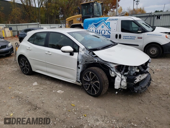 2019 Toyota Corolla Hatchback SE with VIN JTNK4RBEXK3051691, listed as a Copart auction lot 77159164 with 21,051 mi miles and Salvage Title. Bid and sale history available at carsss.com. Image 4.