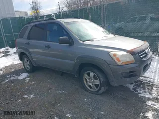 2007 Kia Sportage LX with VIN KNDJF724277371822, listed as a IAAI auction lot 41584838 with 289,846 mi miles. Bid and sale history available at carsss.com. Image 1.