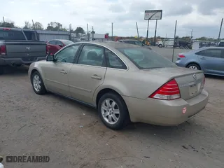2005 Mercury Montego with VIN 1MEHM40195G606109, listed as a IAAI auction lot 40739316 with 329,715 mi miles. Bid and sale history available at carsss.com. Image 3.