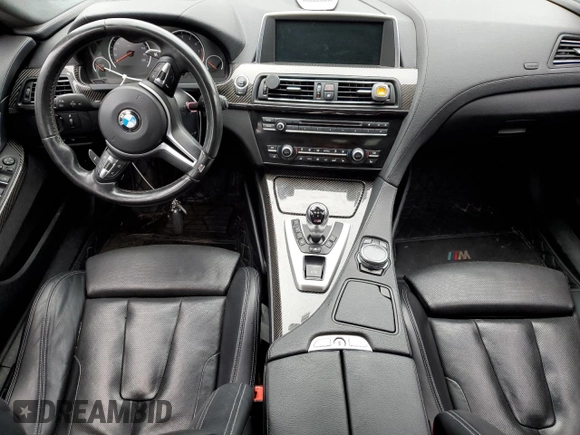 2015 BMW M6 z VIN WBS6C9C59FD467652, wystawiony jako Copart lot #66093293 z przebiegiem Nie podano mil oraz . Historia ofert i sprzedaży dostępna na DreamBid. Obrazek 8.