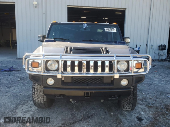 2007 Hummer H2 SUV z VIN 5GRGN23U07H104802, wystawiony jako Copart lot #41957875 z przebiegiem 161 755 mil mil oraz Szkoda całkowita • Salvage title. Historia ofert i sprzedaży dostępna na DreamBid. Obrazek 5.
