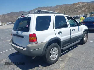2004 Ford Escape XLT with VIN 1FMCU031X4KA88678, listed as a IAAI auction lot 42616524 with Not provided miles and . Bid and sale history available at DreamBid. Image 4.