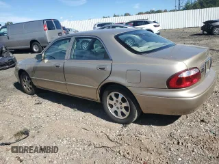 2001 Mazda 626 LX with VIN 1YVGF22C815231985, listed as a Copart auction lot 74913884 with 52,699 mi miles and Clean Title. Bid and sale history available at carsss.com. Image 2.