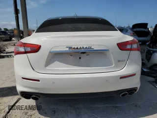 2018 Maserati Ghibli z VIN ZAM57XSAXJ1278606, wystawiony jako Copart lot #55722585 z przebiegiem 50 007 mil mil oraz Szkoda całkowita • Salvage title. Historia ofert i sprzedaży dostępna na DreamBid. Obrazek 6.