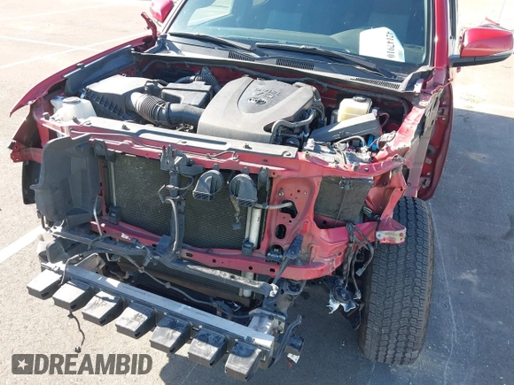 2021 Toyota Tacoma SR z VIN 5TFCZ5AN8MX247421, wystawiony jako IAAI lot #42147910 z przebiegiem 94 467 mil mil oraz . Historia ofert i sprzedaży dostępna na DreamBid. Obrazek 6.