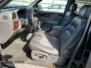 2003 GMC Envoy SLT z VIN 1GKET16PX36243554, wystawiony jako Copart lot #49083975 z przebiegiem 148 596 mil mil oraz Szkoda całkowita • Salvage title. Historia ofert i sprzedaży dostępna na DreamBid. Obrazek 7.