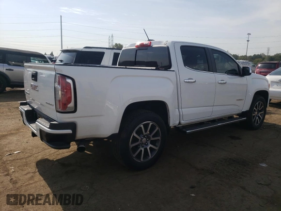 2020 GMC Canyon 4WD Denali with VIN 1GTG6EEN1L1232751, listed as a Copart auction lot 74719334 with 115,105 mi miles and Salvage Title. Bid and sale history available at carsss.com. Image 3.