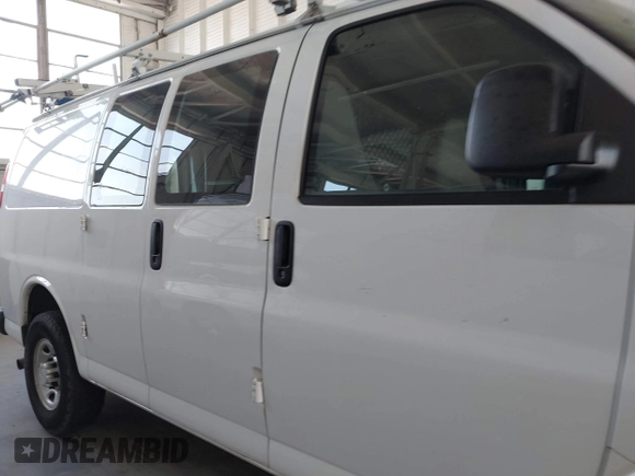 2015 Chevrolet Express Cargo with VIN 1GCWGFCF9F1277631, listed as a IAAI auction lot 42528992 with 243,209 mi miles and . Bid and sale history available at DreamBid. Image 13.