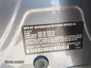 2013 BMW 5 Series 550i xDrive with VIN WBAFU9C54DDY72137, listed as a IAAI auction lot 41794124 with 58,647 mi miles and . Bid and sale history available at carsss.com. Image 9.