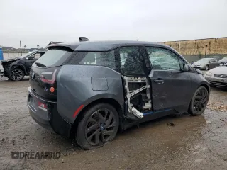 2017 BMW i3 z VIN WBY1Z8C38HV890419, wystawiony jako Copart lot #52199865 z przebiegiem Nie podano mil oraz Szkody całkowita. Historia ofert i sprzedaży dostępna na DreamBid. Obrazek 3.