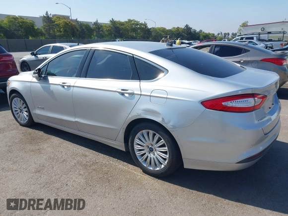 2016 Ford Fusion SE Hybrid z VIN 3FA6P0LU8GR203934, wystawiony jako IAAI lot #42595741 z przebiegiem 84 189 mil mil oraz . Historia ofert i sprzedaży dostępna na DreamBid. Obrazek 3.