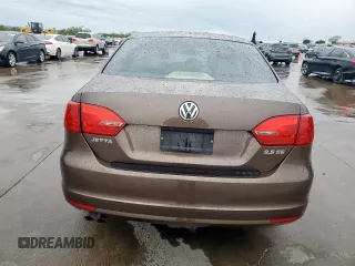 2013 Volkswagen Jetta SE with VIN 3VWDX7AJ9DM443065, listed as a Copart auction lot 51006995 with 93,981 mi miles and Salvage title. Bid and sale history available at DreamBid. Image 6.