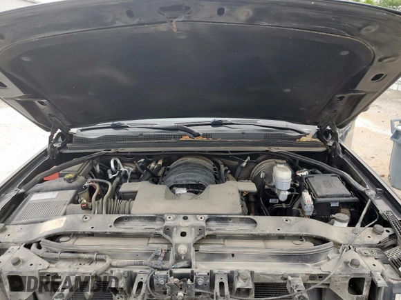 2020 Chevrolet Tahoe LT with VIN 1GNSCBKC5LR203301, listed as a Copart auction lot 57071315 with 106,376 mi miles and Salvage title. Bid and sale history available at DreamBid. Image 12.