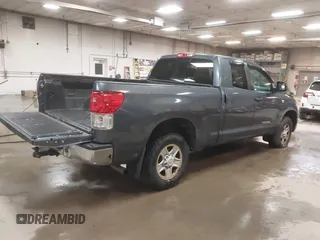 2010 Toyota Tundra 4WD Truck with VIN 5TFUM5F16AX006879, listed as a IAAI auction lot 40447273 with 219,498 mi miles. Bid and sale history available at carsss.com. Image 4.