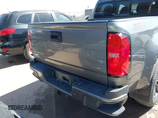 2021 Chevrolet Colorado 4WD Z71 z VIN 1GCGTDEN7M1117558, wystawiony jako IAAI lot #41911673 z przebiegiem 51 838 mil mil oraz . Historia ofert i sprzedaży dostępna na DreamBid. Obrazek 17.