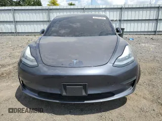 2020 Tesla Model 3 Standard Range Plus with VIN 5YJ3E1EA6LF614045, listed as a Copart auction lot 65222584 with 59,823 mi miles and Salvage Title. Bid and sale history available at DreamBid. Image 5.
