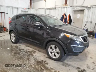 2012 Kia Sportage LX z VIN KNDPB3A24C7179584, wystawiony jako Copart lot #60938465 z przebiegiem 161 362 mil mil oraz Czysty tytuł • Clean title. Historia ofert i sprzedaży dostępna na DreamBid. Obrazek 4.