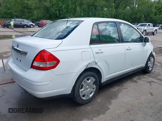 2010 Nissan Versa S with VIN 3N1BC1AP2AL409285, listed as a IAAI auction lot 42182721 with 266,855 mi miles and . Bid and sale history available at DreamBid. Image 4.