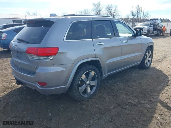 2014 Jeep Grand Cherokee Overland with VIN 1C4RJFCT8EC246264, listed as a IAAI auction lot 41692795 with 197,851 mi miles. Bid and sale history available at carsss.com. Image 4.