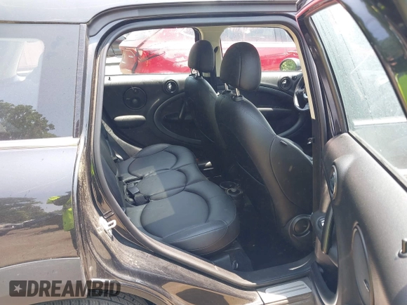 2015 MINI Countryman S with VIN WMWZC5C56FWP45115, listed as a IAAI auction lot 42426394 with 52,937 mi miles and . Bid and sale history available at DreamBid. Image 8.