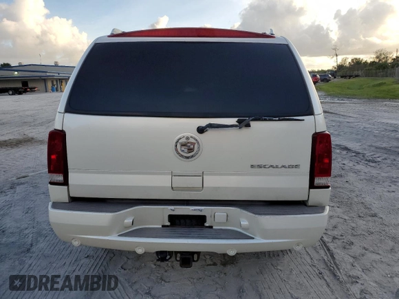 2003 Cadillac Escalade z VIN 1GYEC63T83R133508, wystawiony jako Copart lot #80091524 z przebiegiem Nie podano mil oraz Szkoda całkowita • Salvage title. Historia ofert i sprzedaży dostępna na DreamBid. Obrazek 6.